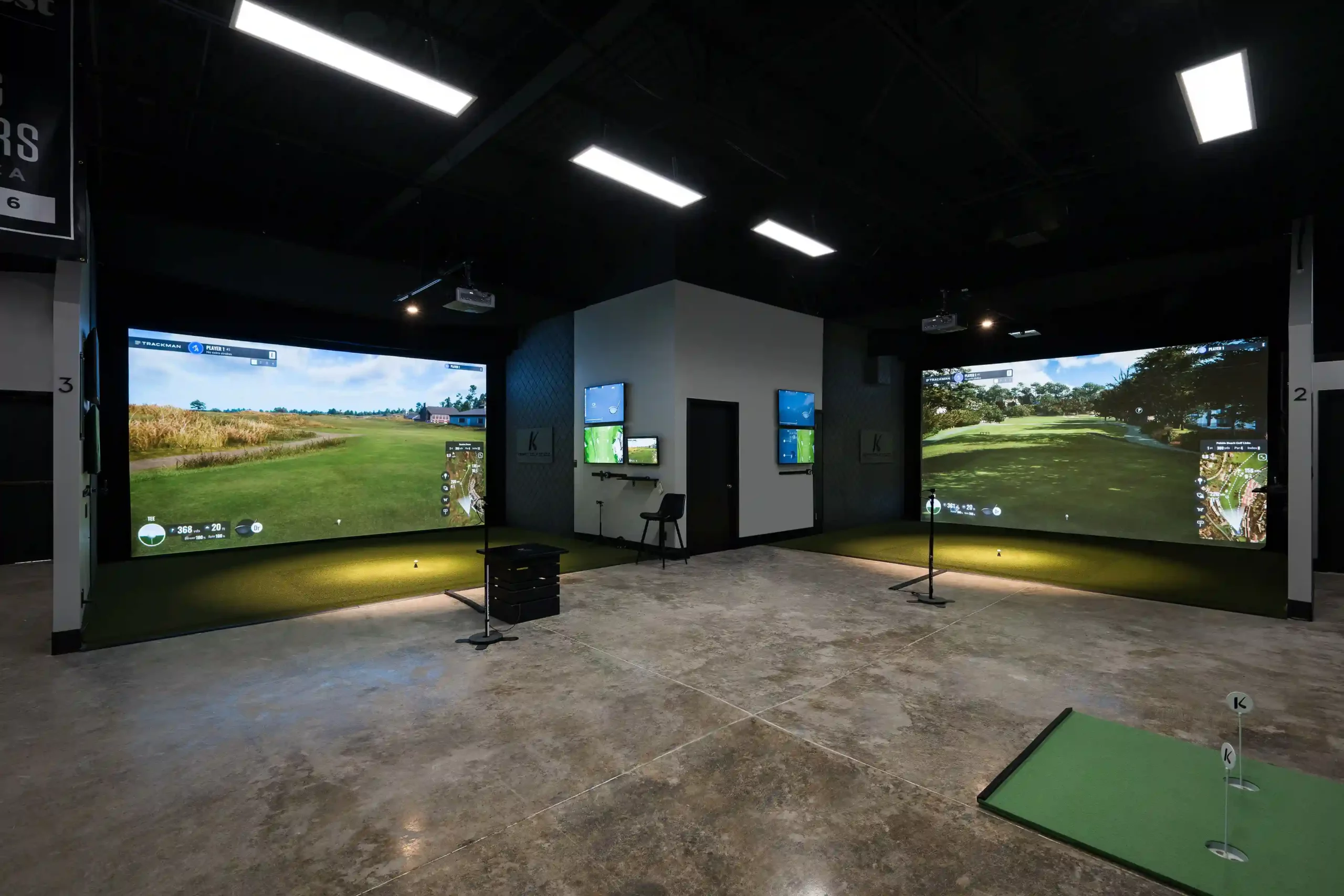 Two golf simulators in business building